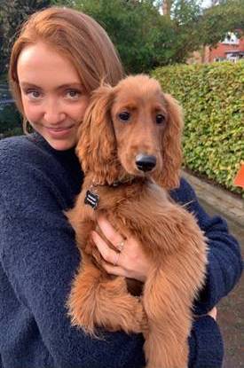 Lillie's spinal CSF leak story: A photo of Lillie and her dog 
