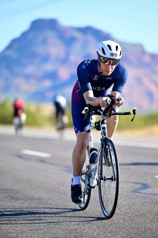 The Sky's the Limit : A Friendship Reaches New Heights. Anthony on his bike during the Ironman